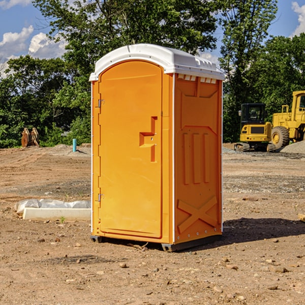 how often are the portable restrooms cleaned and serviced during a rental period in Aurelia IA